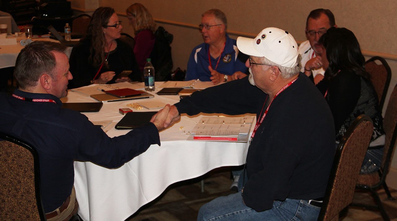 people talking at table