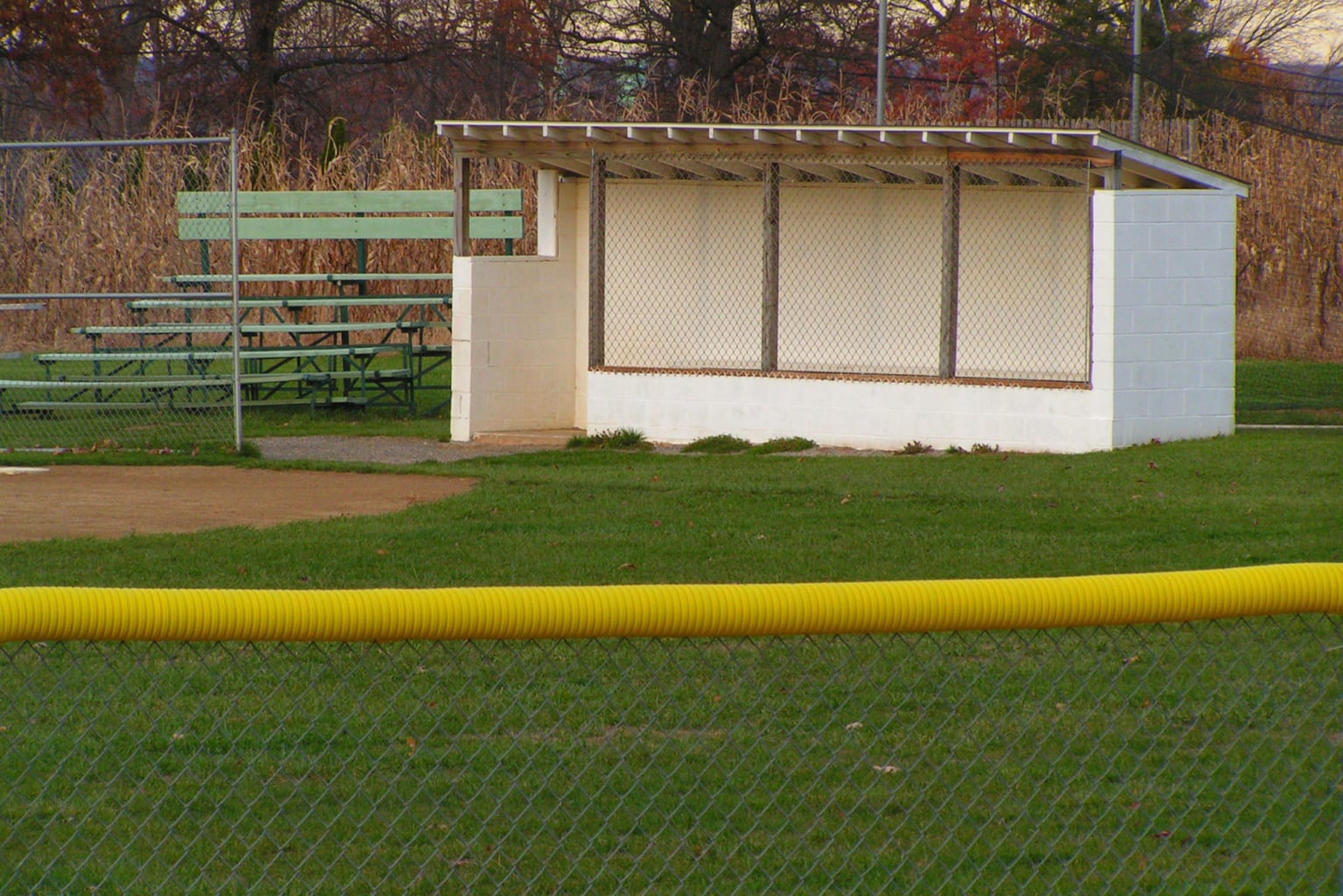 empty dugout in the background