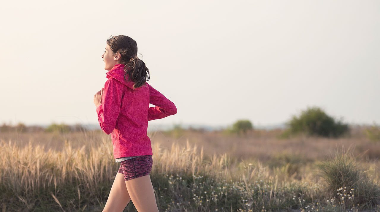 girl running beach