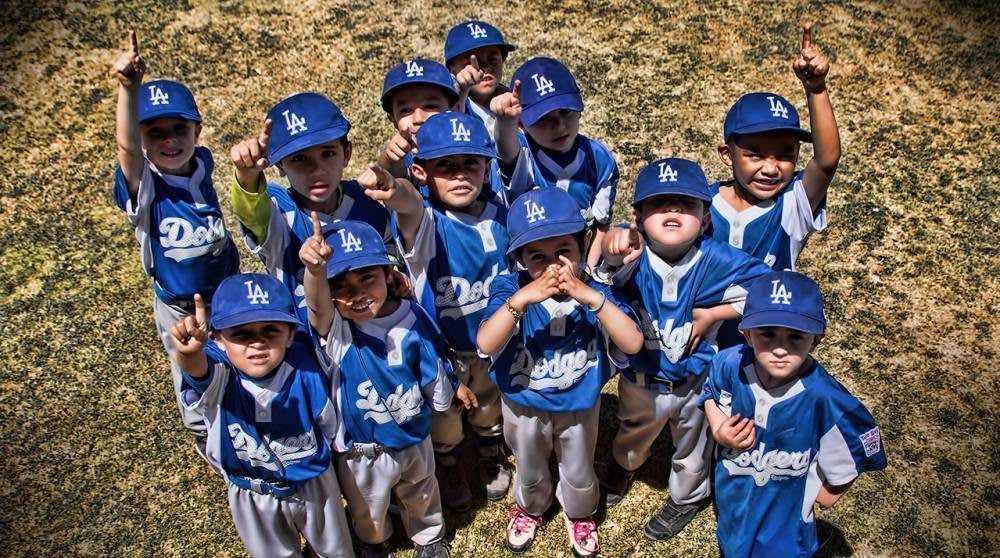 Young baseball team celebrating win