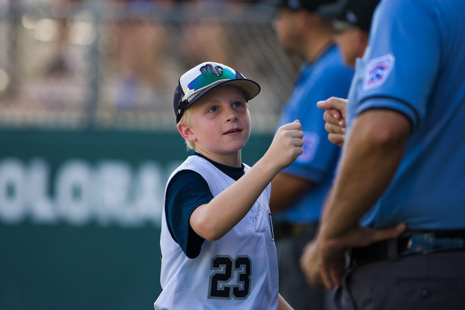 player-fist-bumping-umpire