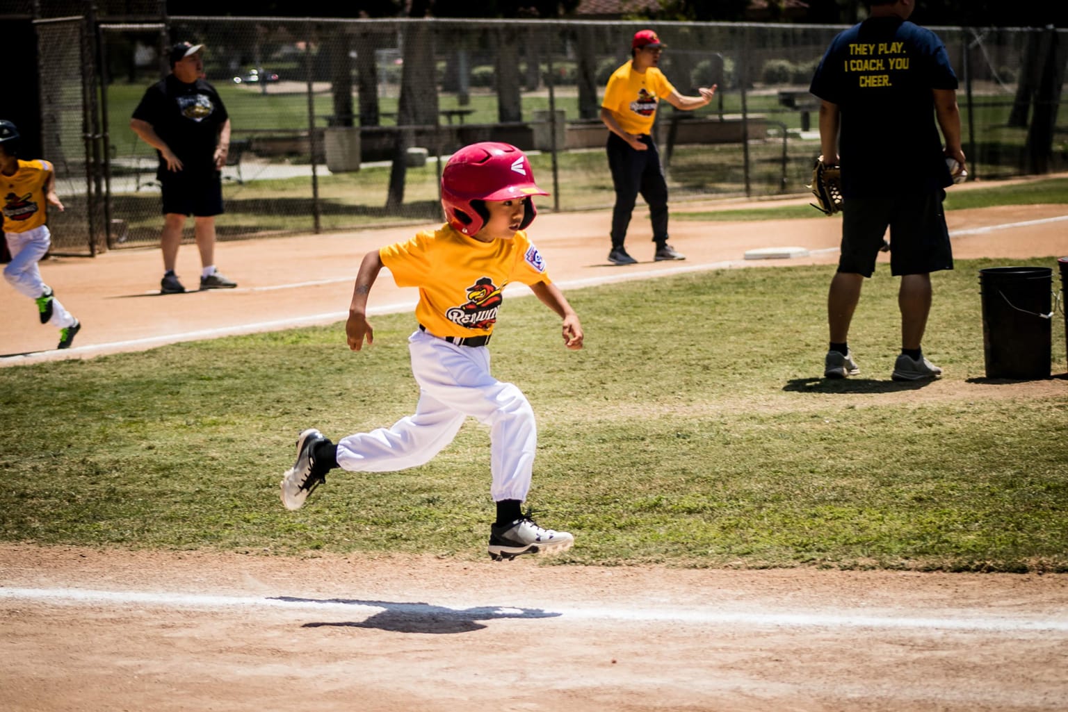 bb player running to first