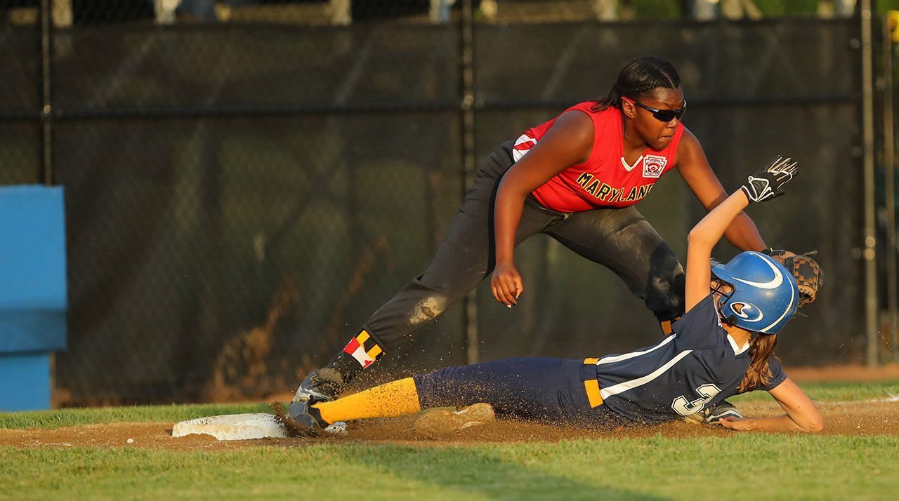 softball player sliding
