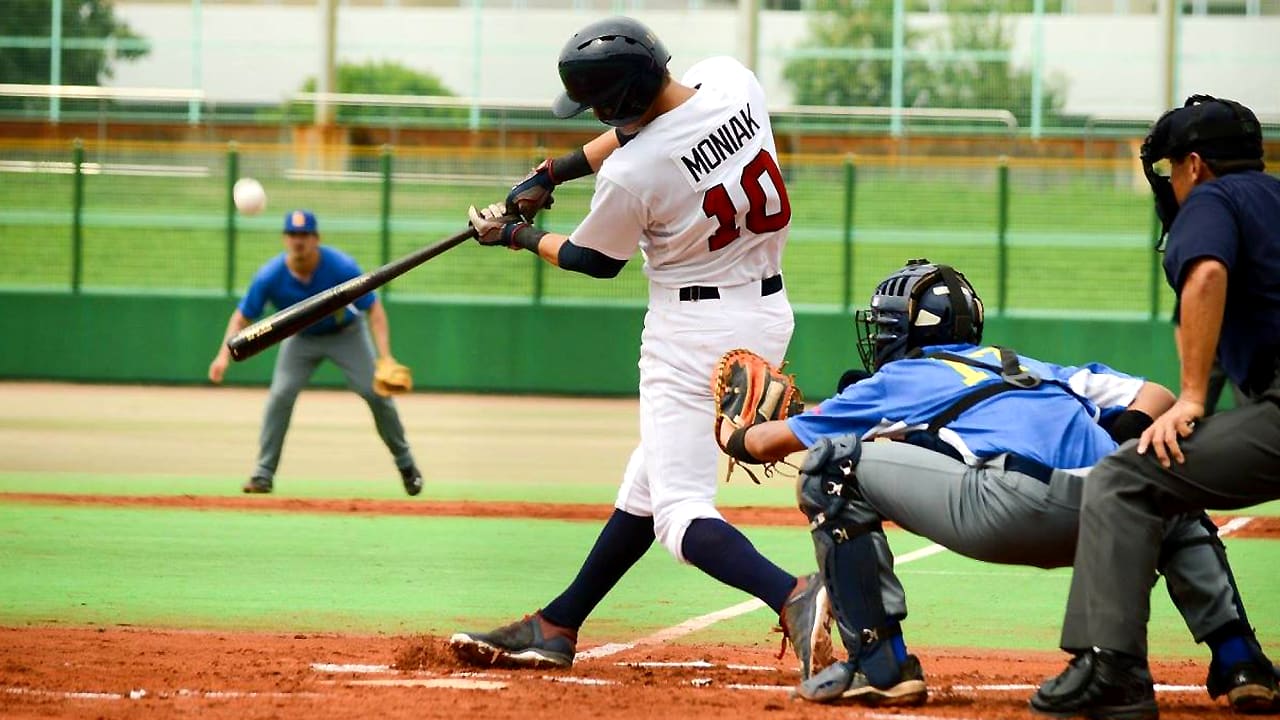 usa baseball player swinging bat