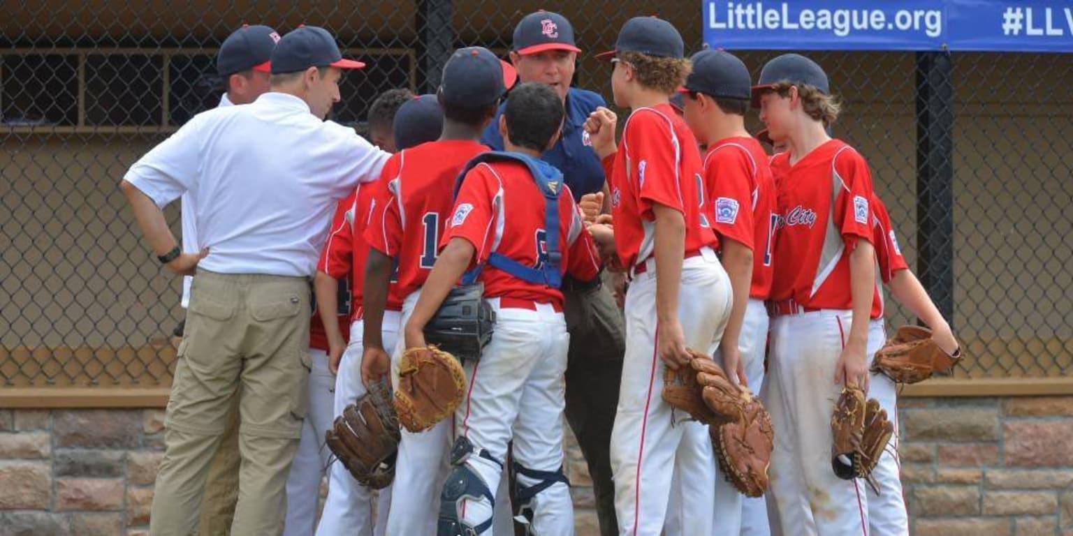 players and coaches in circle