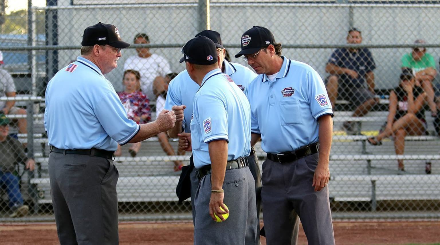 umpires in a huddle