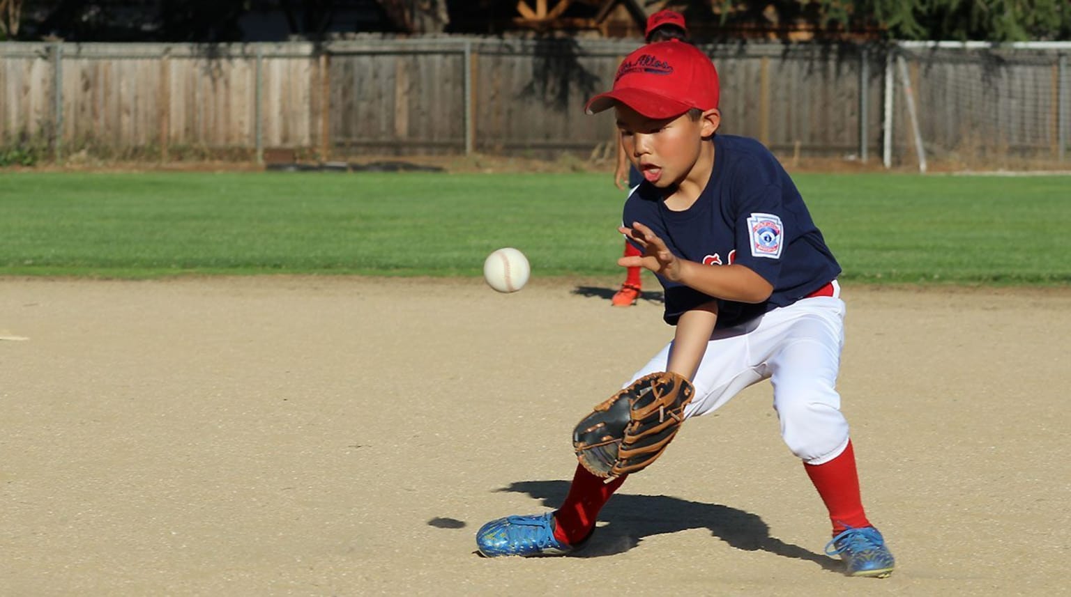 boy catching ball