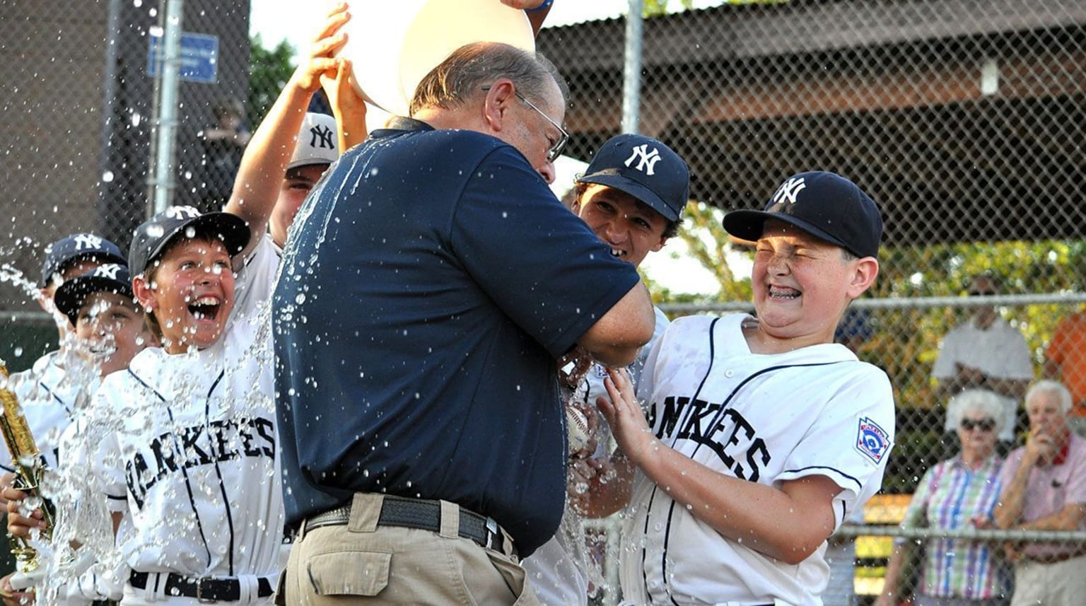 players throwing ice on coach