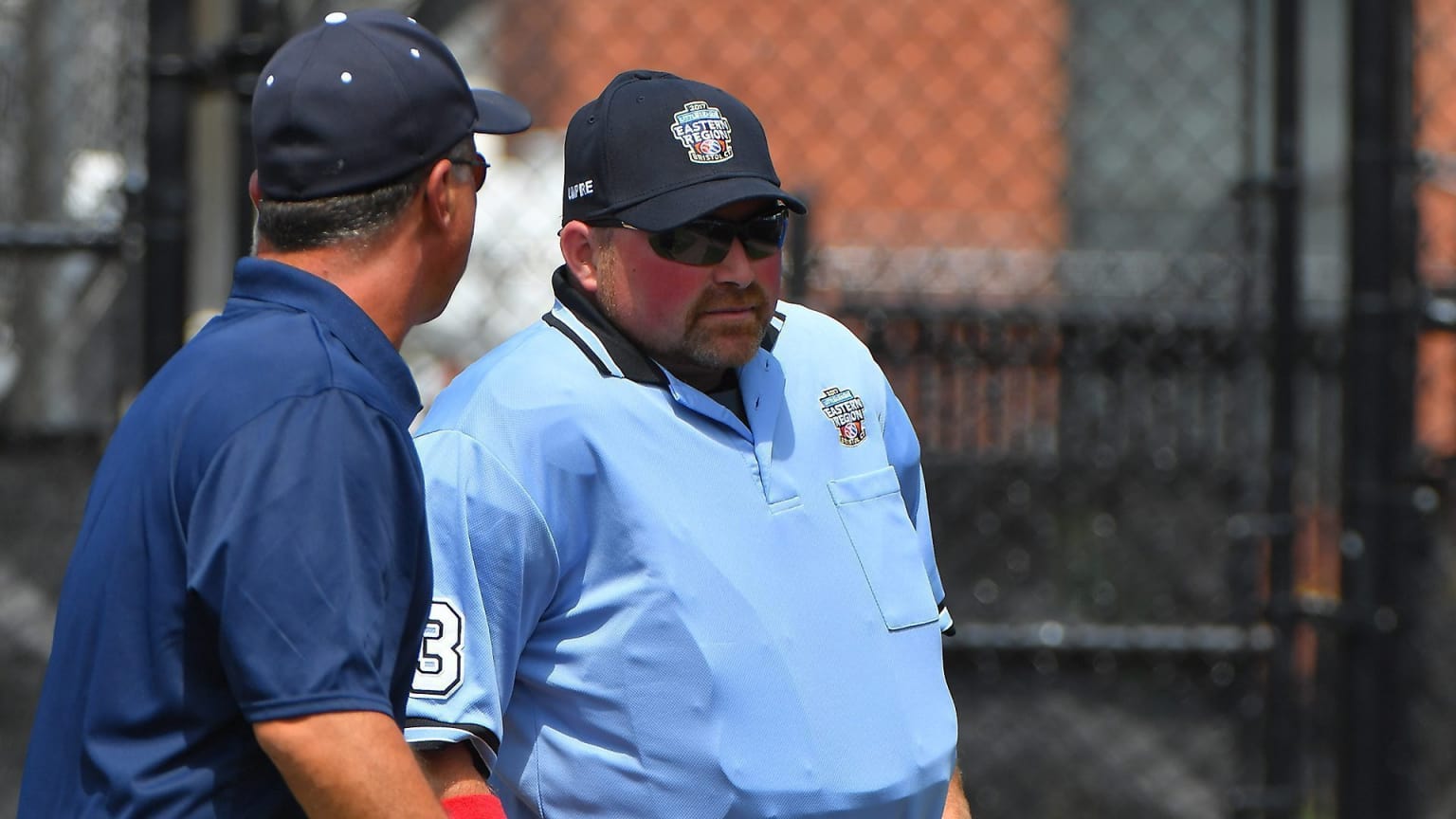 umpire-manager-talking