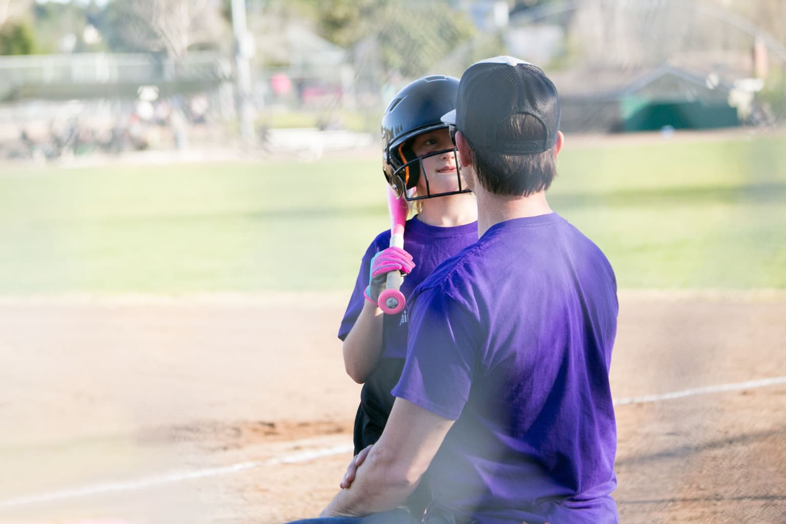 coach-talking-softball-player