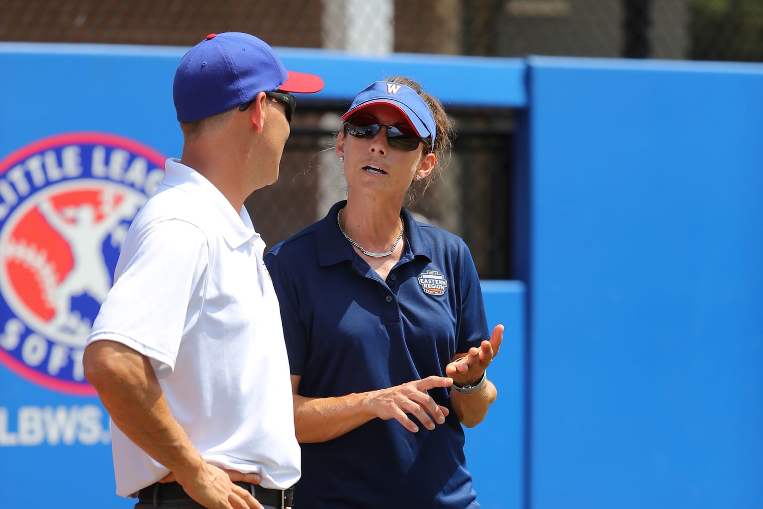 coach-manager-talking-field