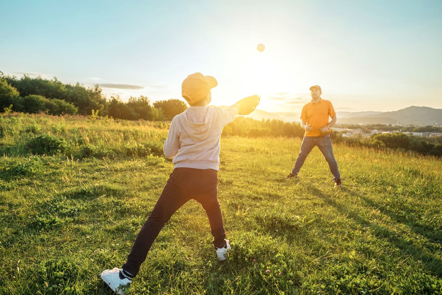 father & son playing catch