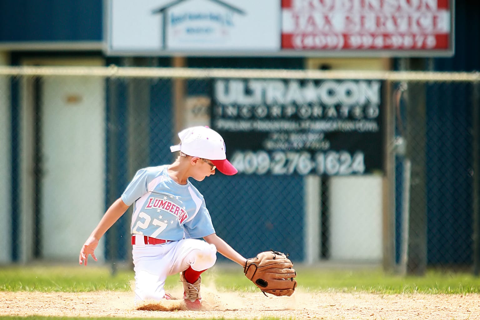 outfielder grabbing groundball