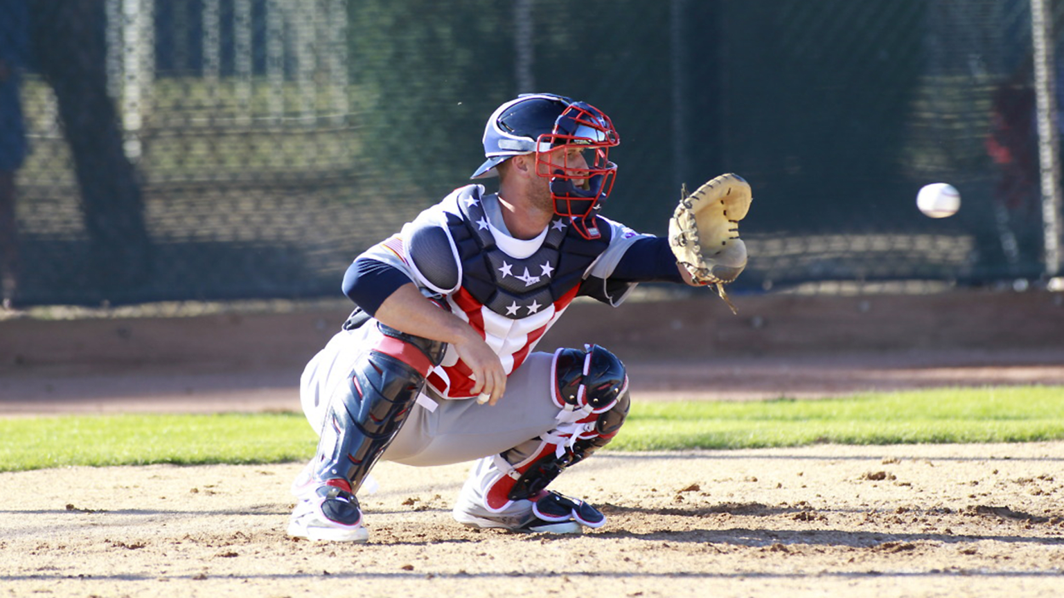 Fastpitch catchers: On your feet or on your knees