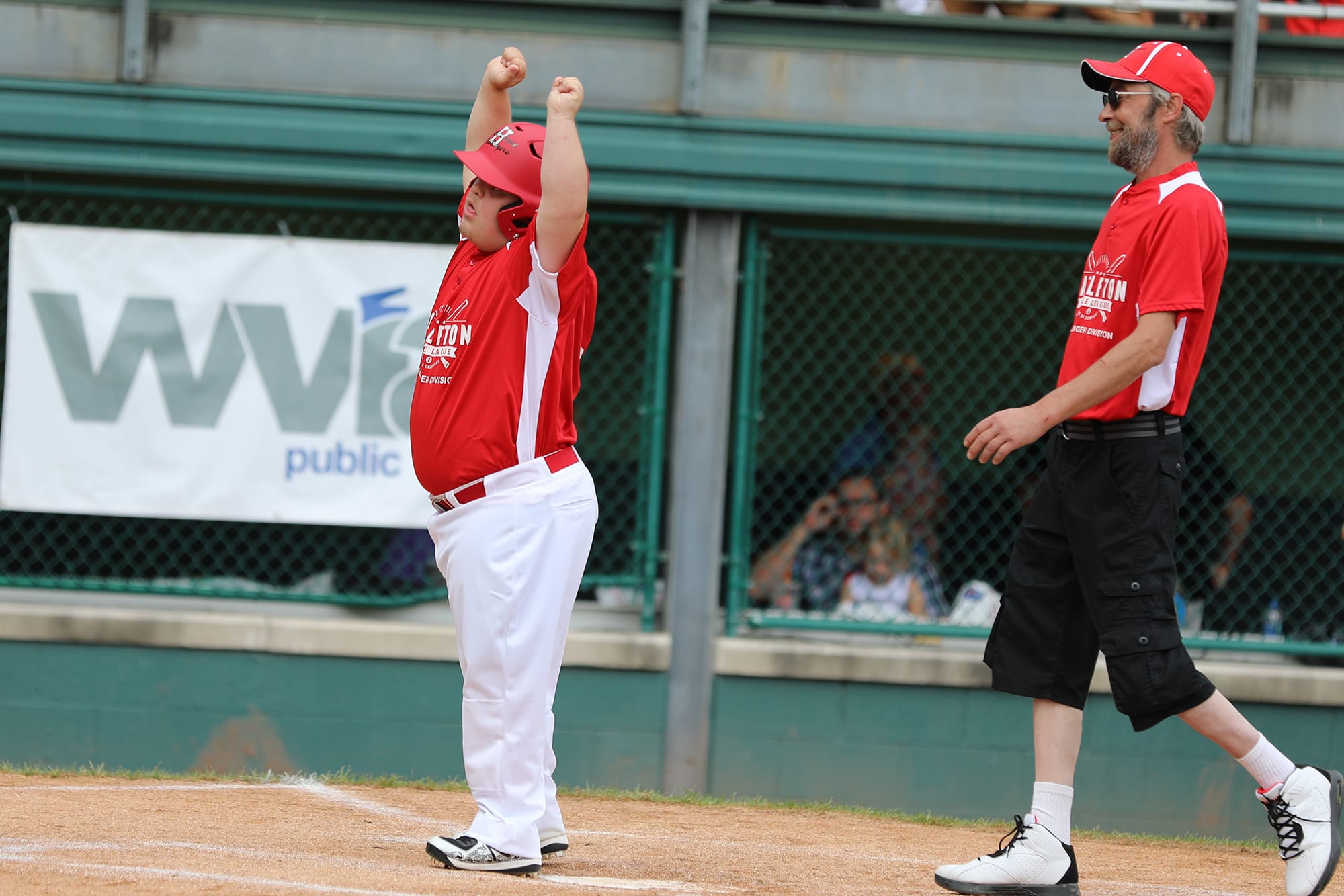 challenger game - player celebrating at homeplate