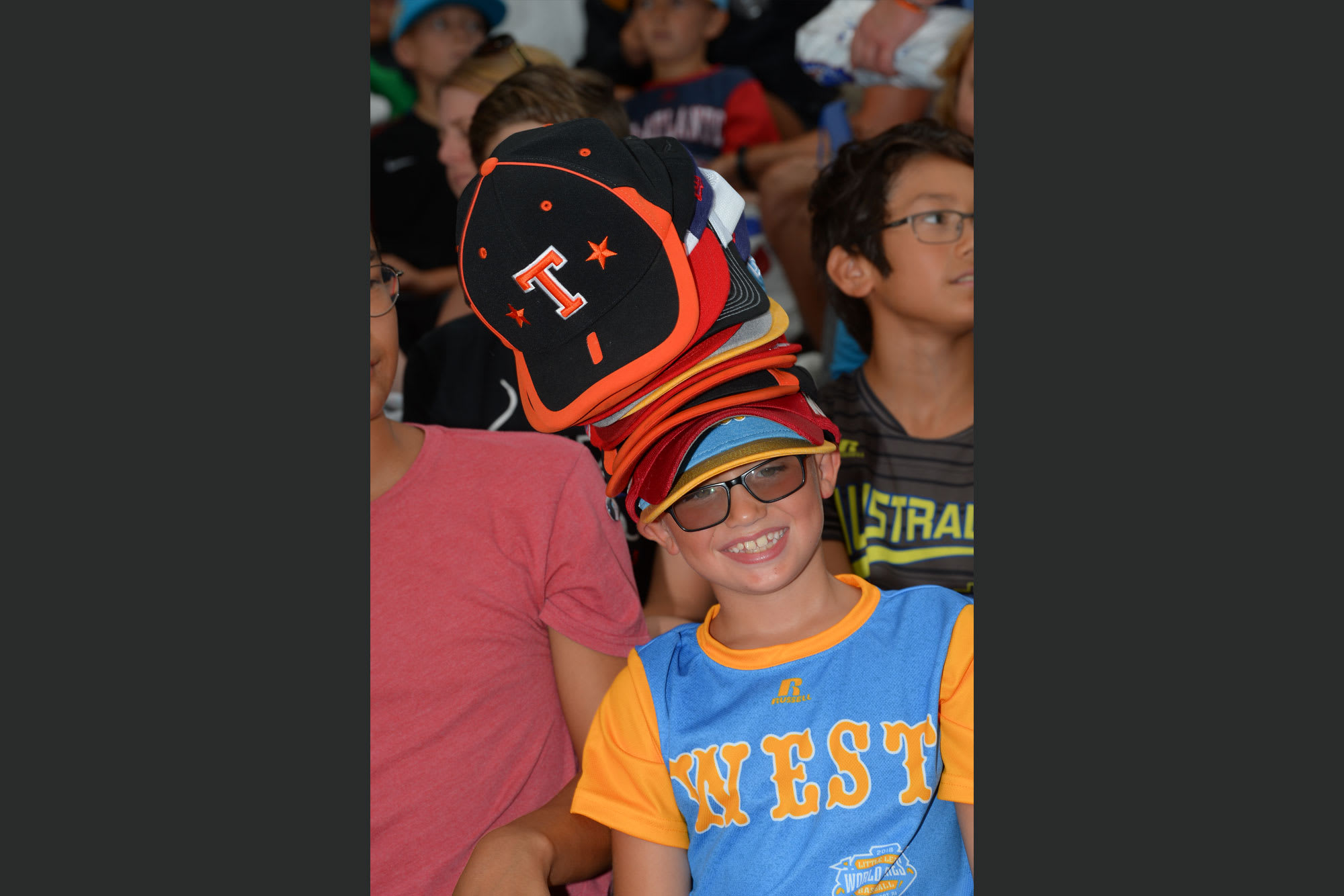llbws fan with lots of hats on head