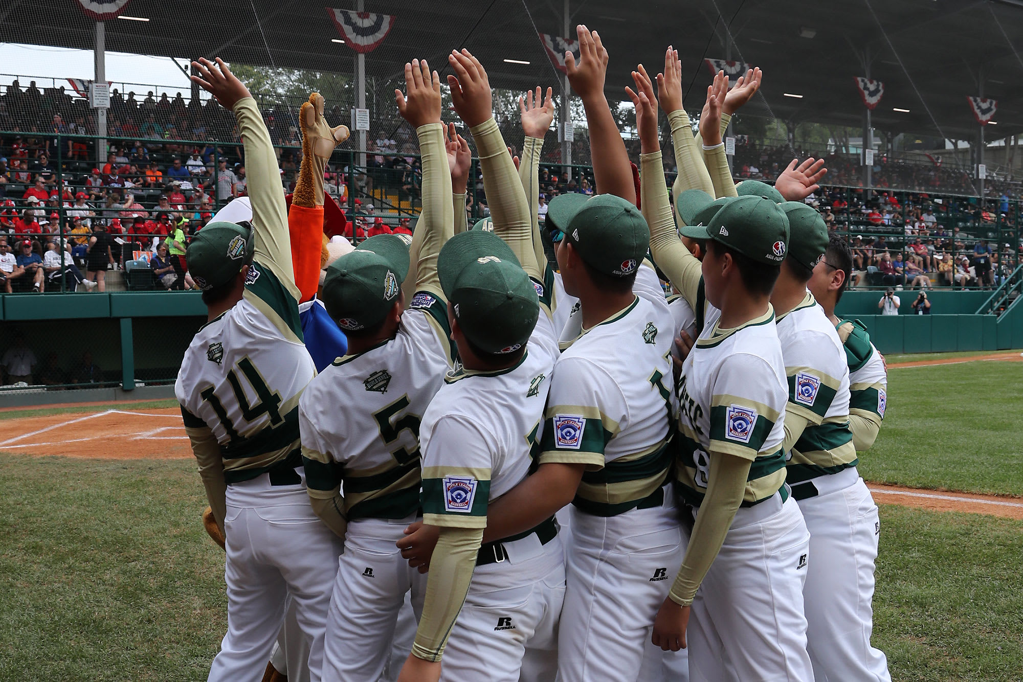 ap team high fiving dugout