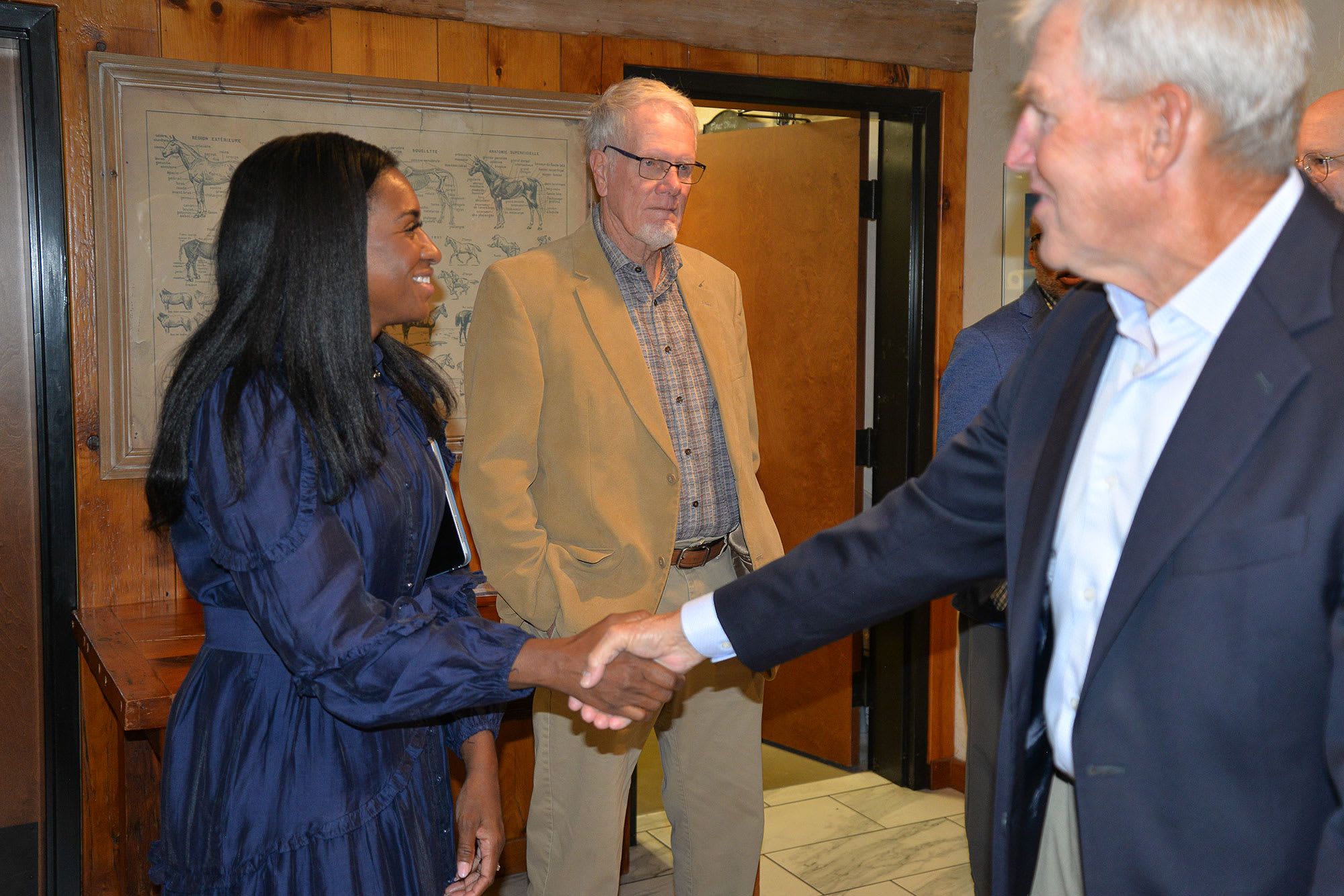 delvina-shaking-hands-web