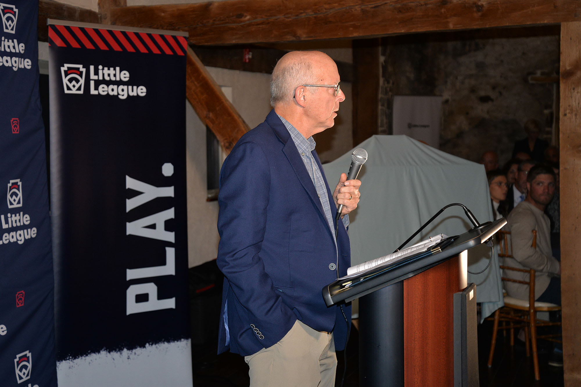 hughes-talking-podium2-web