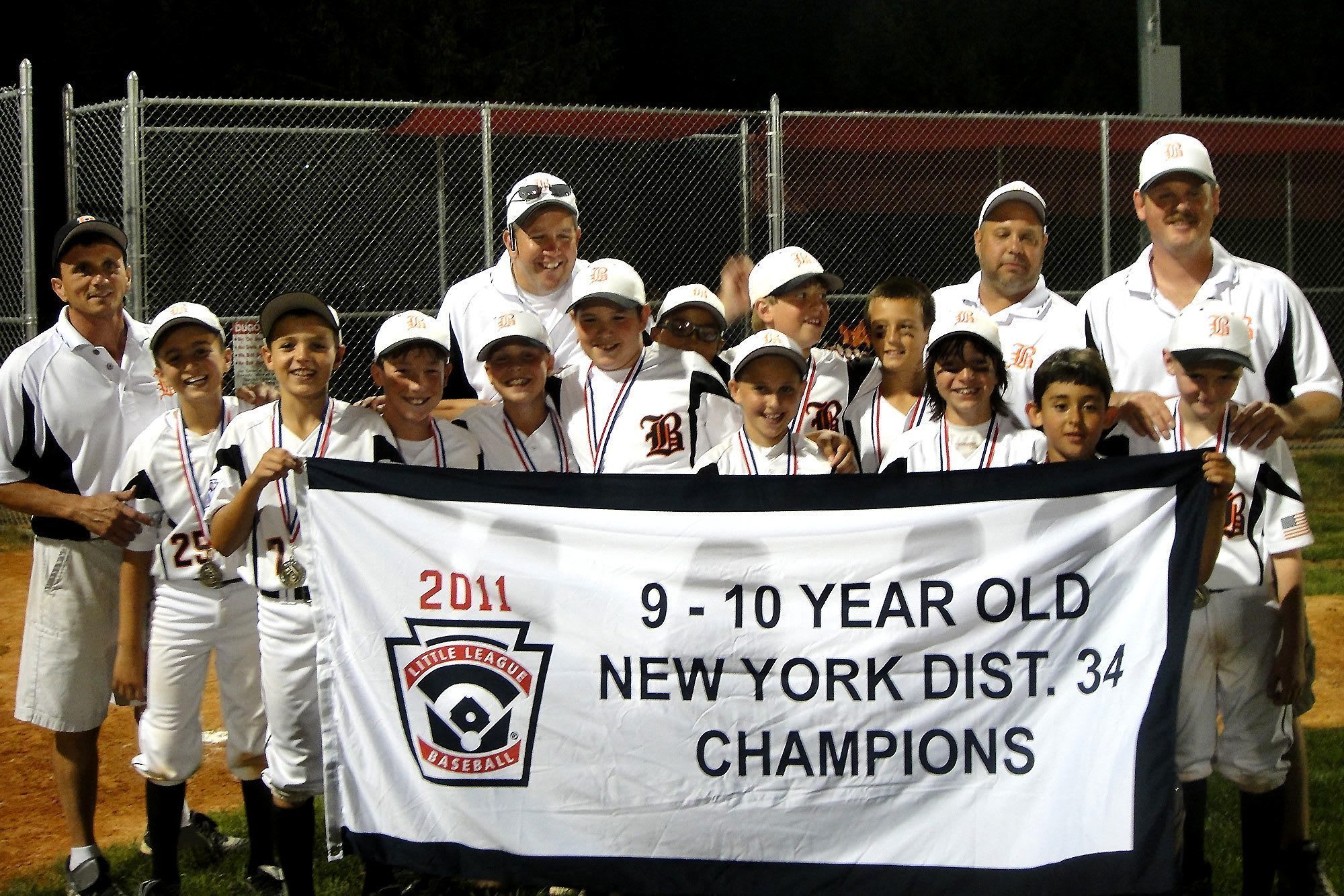 John Pesce with team and coaches