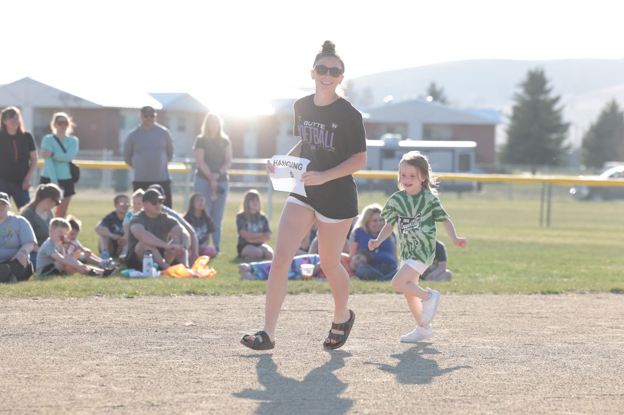 coppercityll-openingceremonies-runningthebases