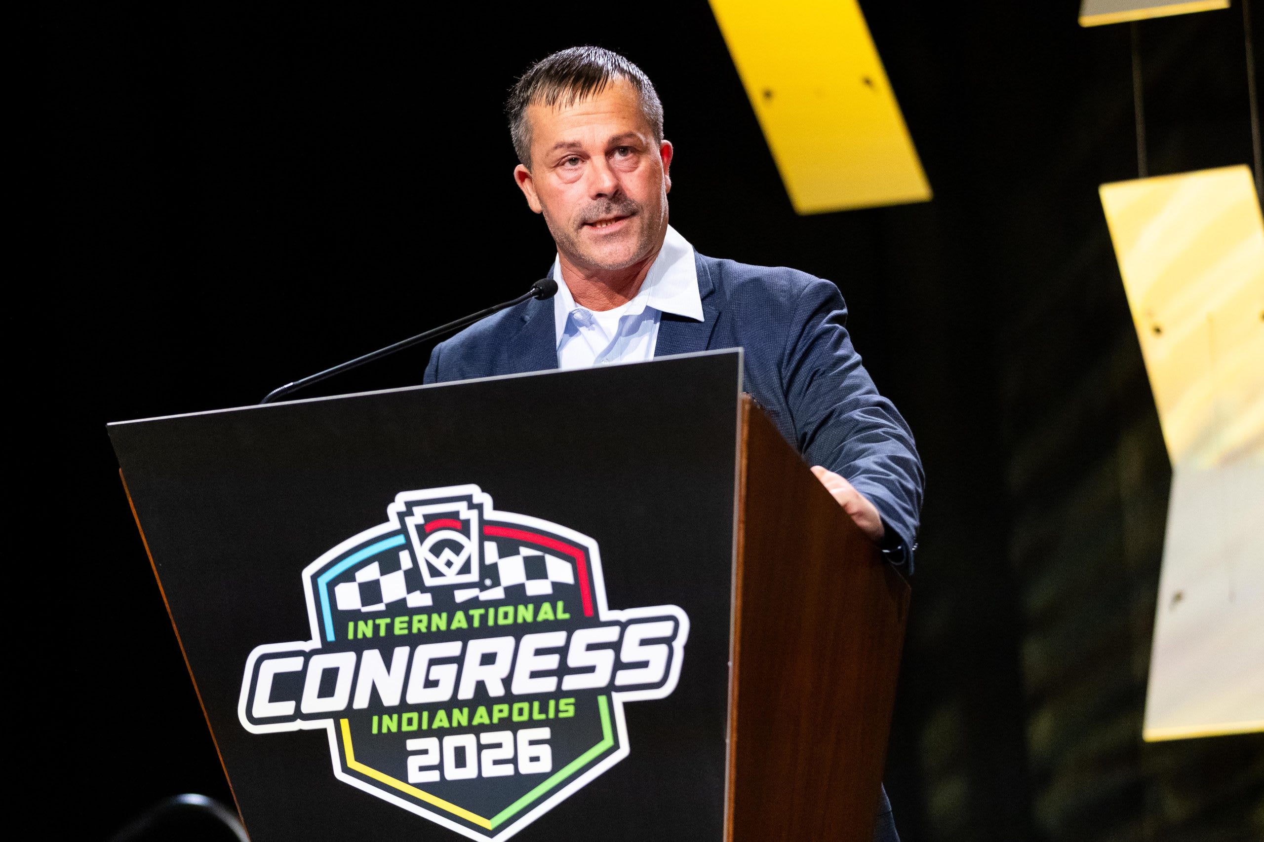 Corey_Podium_2026Congress