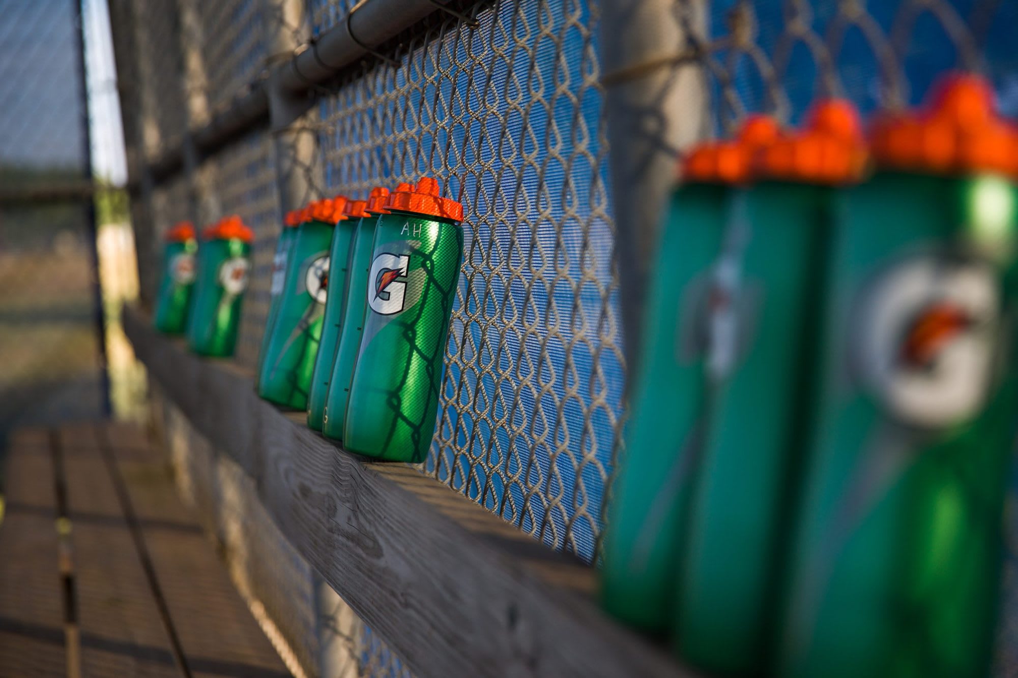 Gatorade Bottles on Fence