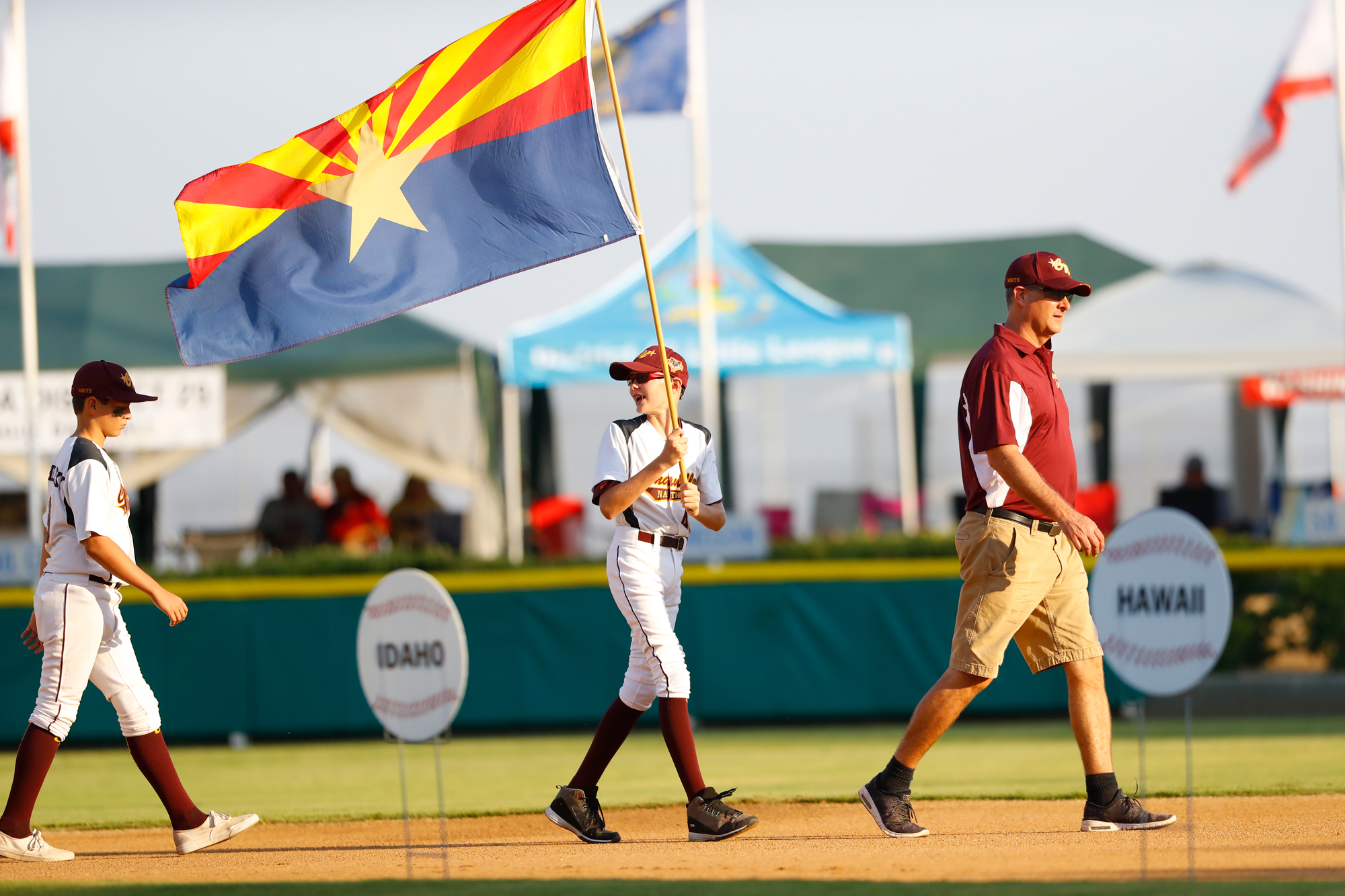 west-region-opening-ceremonies-players-holding-flag