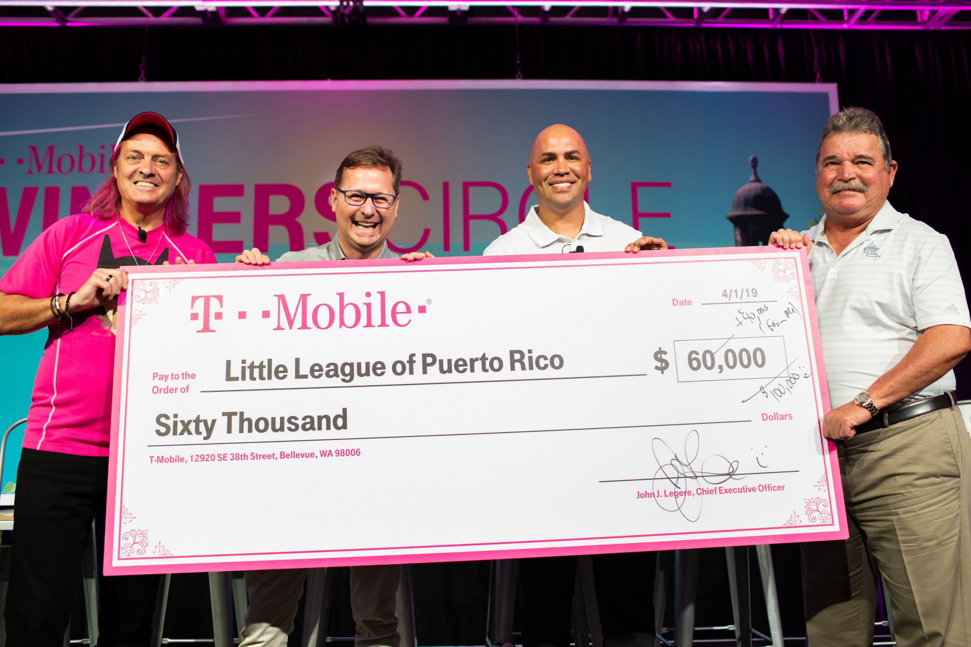 T-Mobile and LL Representatives Accept Giant Check for Local League Grants