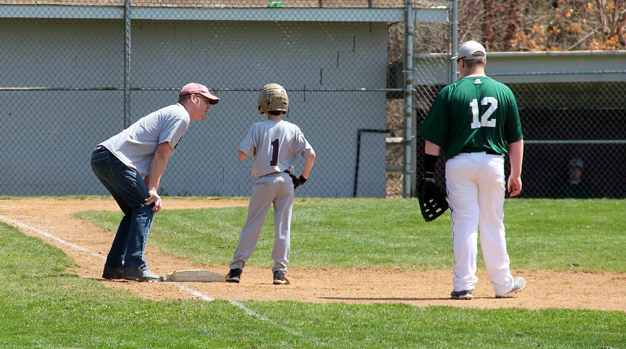coach talking to player