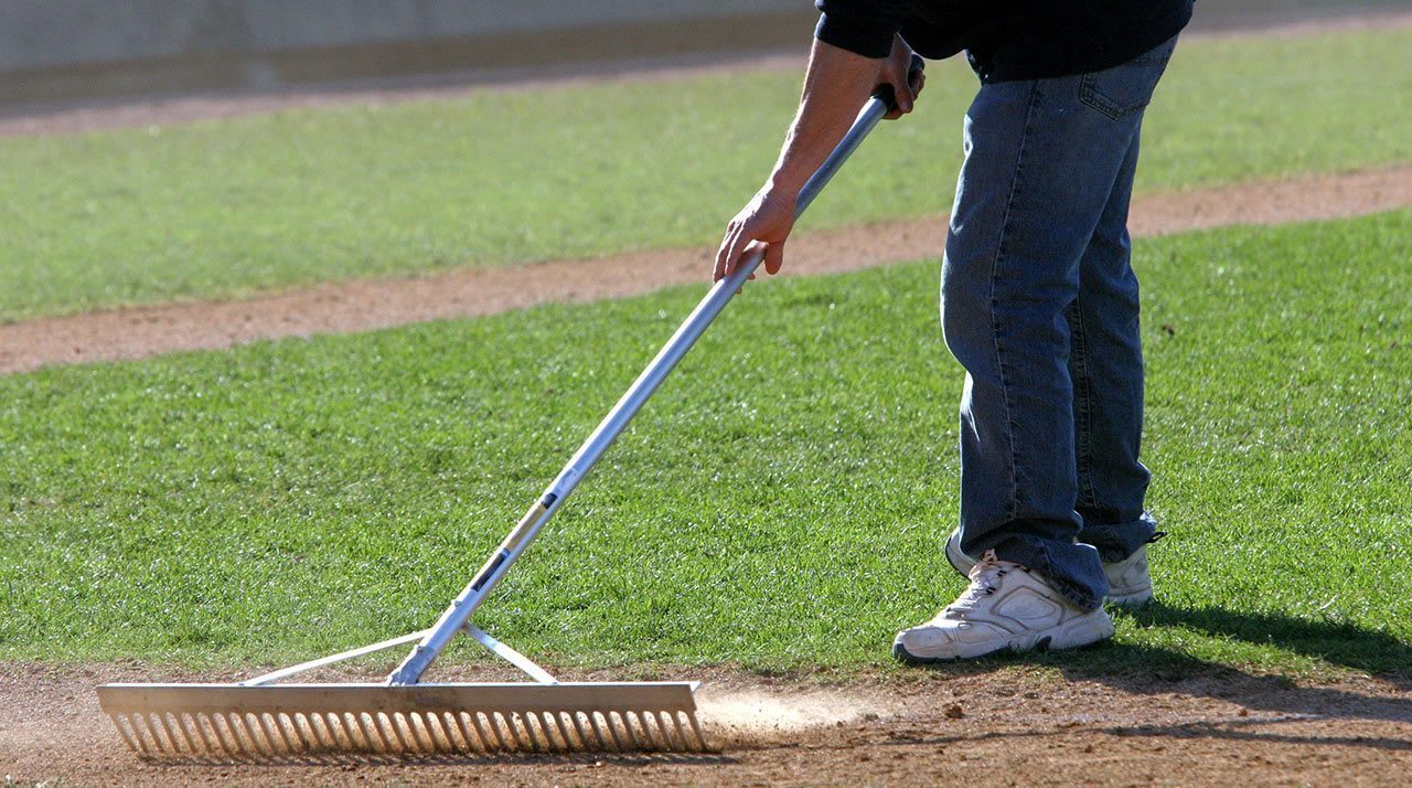 man doing field maintenance
