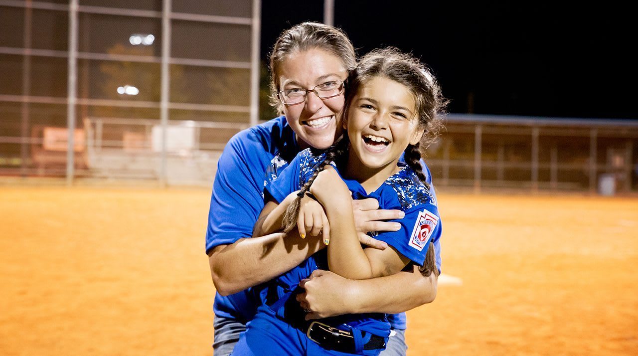 woman and softball player