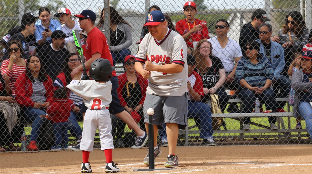 coach & tee ball player