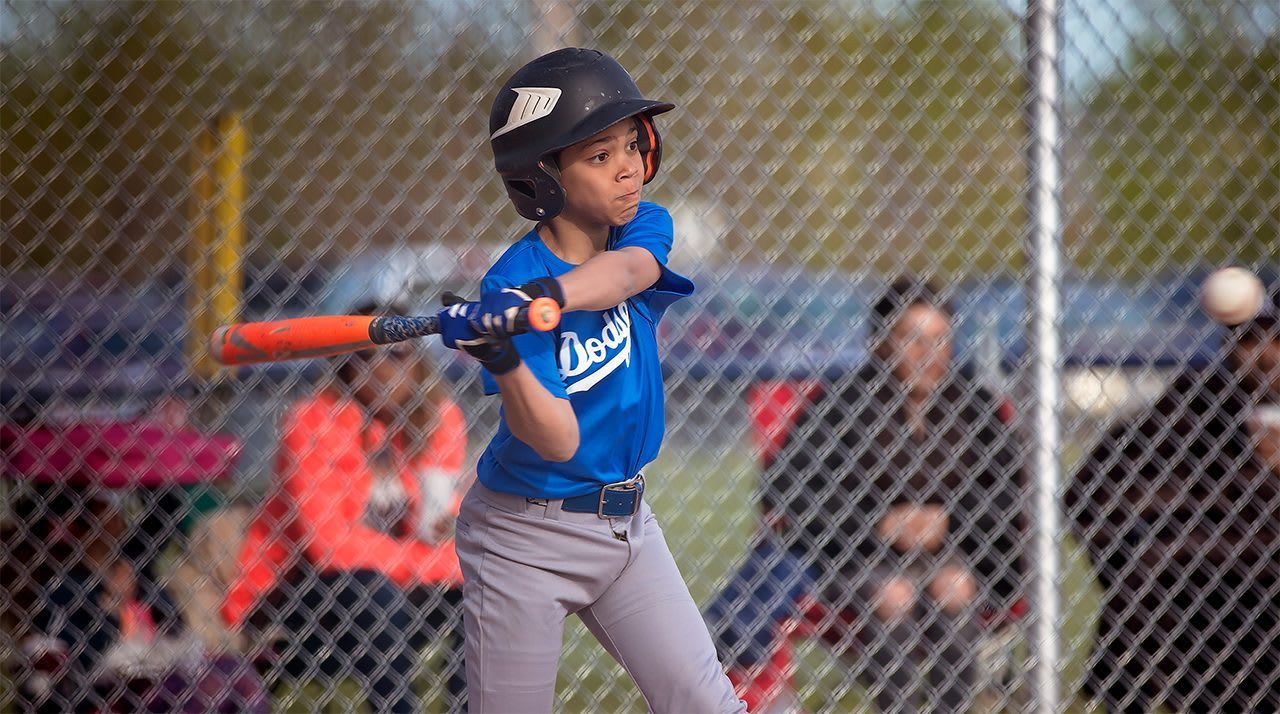 batter swinging