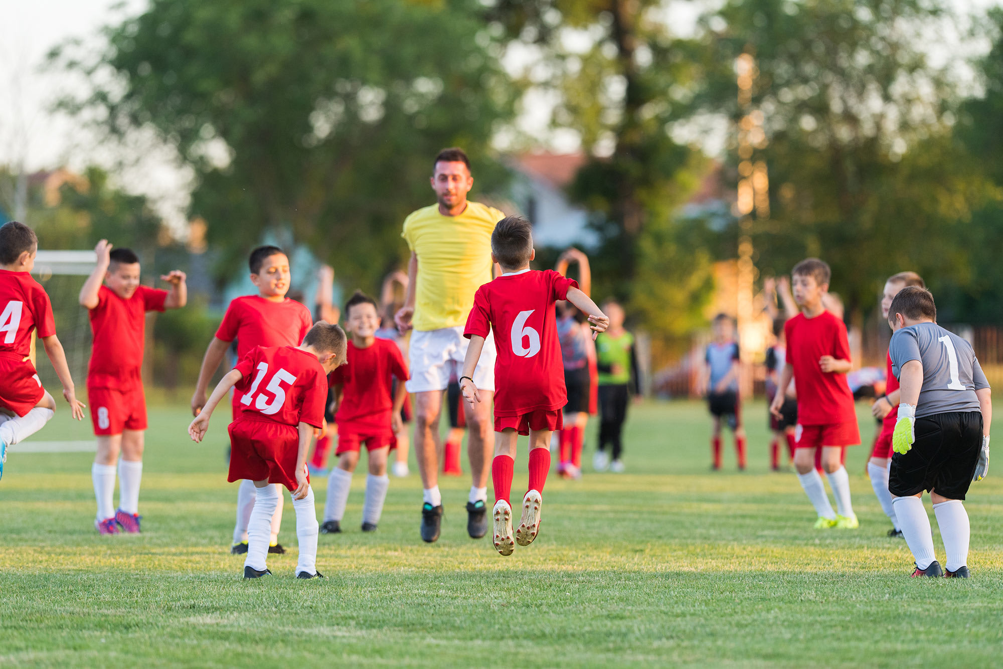 soccer-team-with-coach