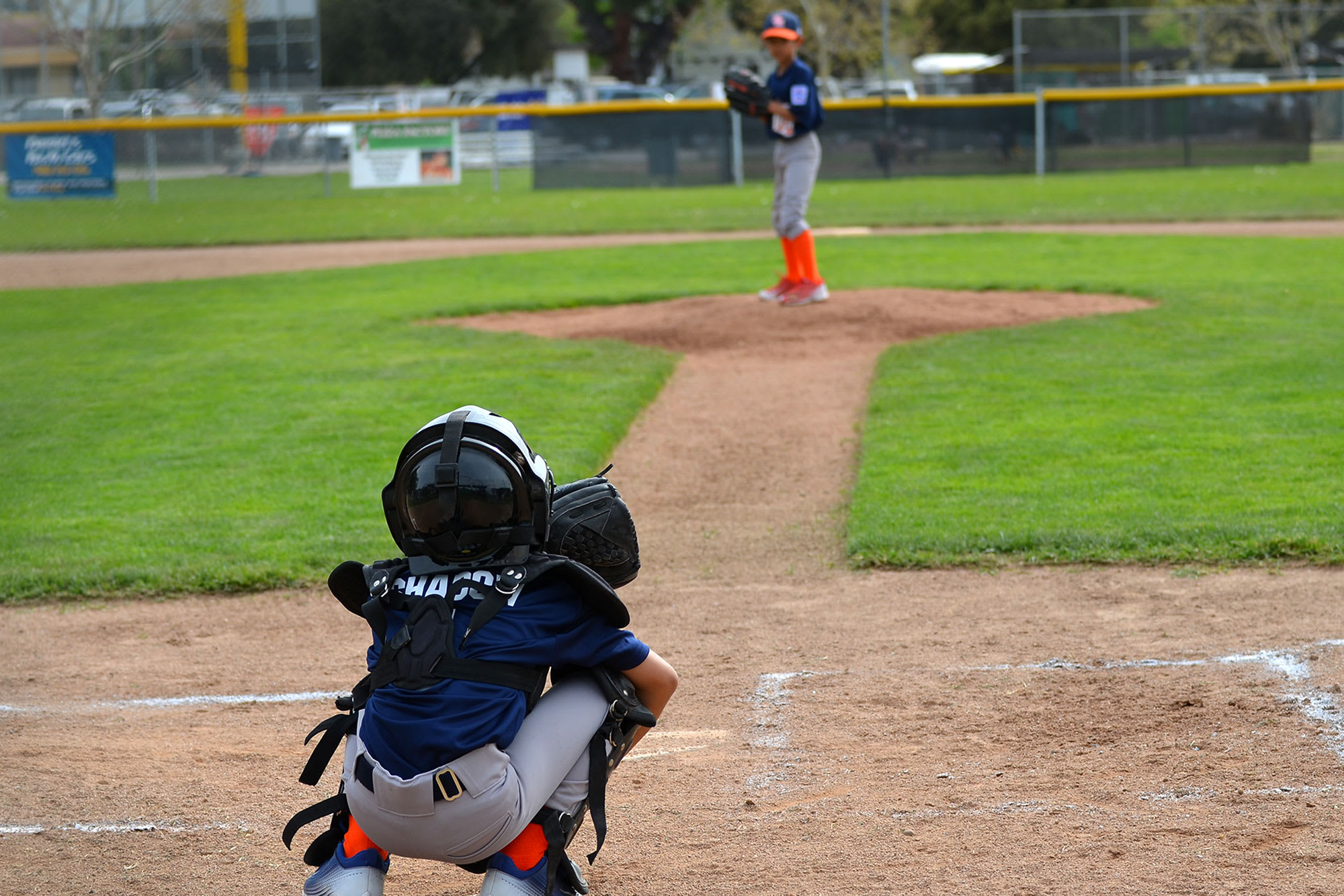 catcher warming up pitcher