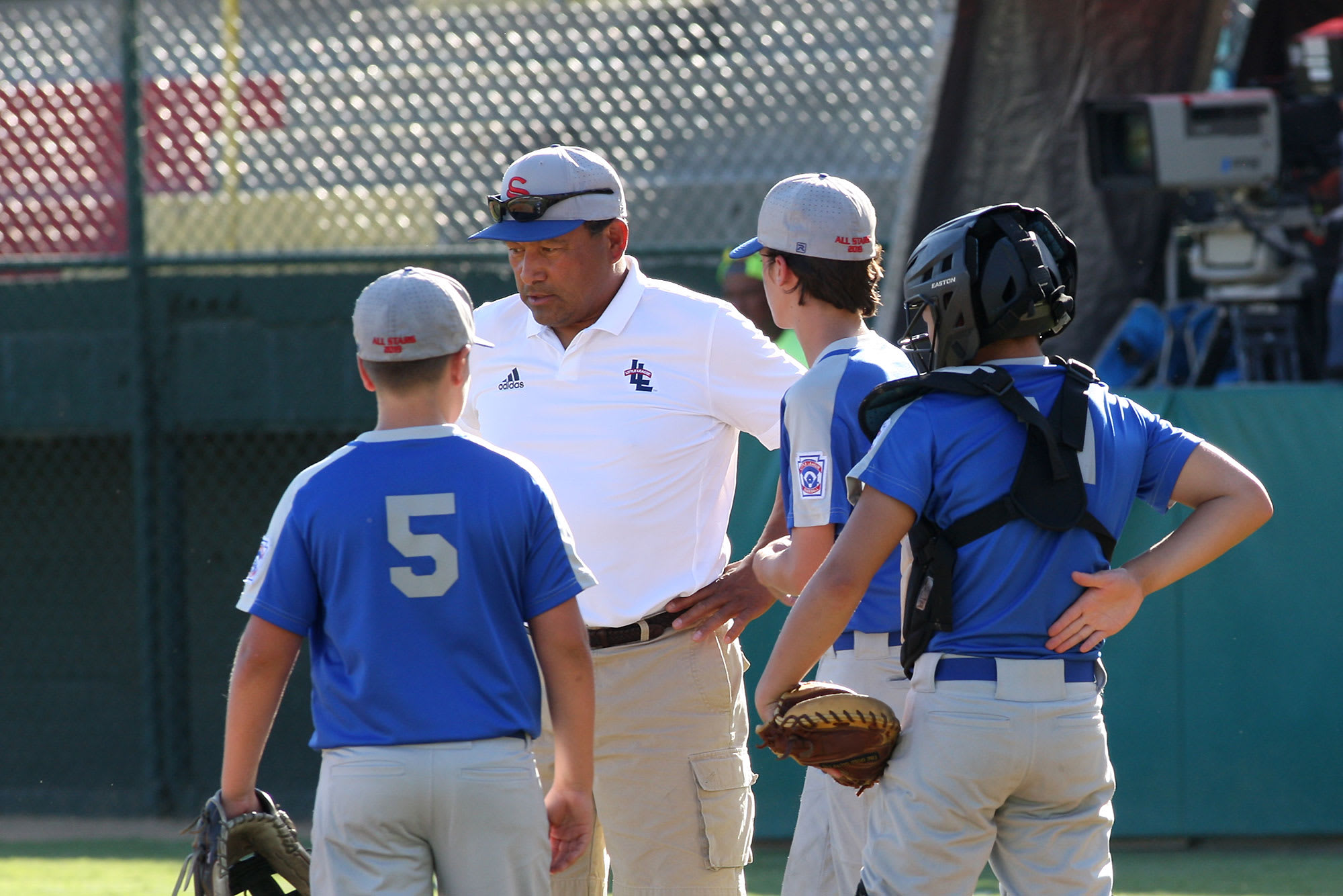 coach talking to players