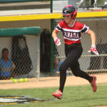 softball player running home