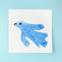 Blue bird painted with water colours on white paper