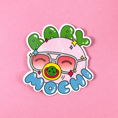 Illustration of a pink mochi rice cake wearing tinted sunglasses and a dummy. Baby Mochi is written in bubble letters around it.