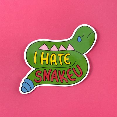 Slightly sad green snake with a tear on its face has "I Hate Snakeu" written on it