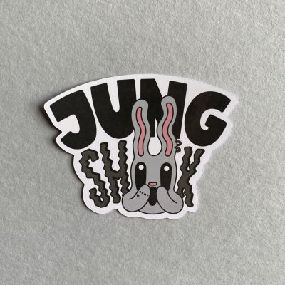 Sticker of grey rabbit looking shocked. Jung Shook is drawn in black and grey letters behind the rabbit.