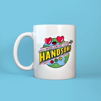 Front view of a mug with an illustration of a globe with heart eyes and hand drawn text across saying: Worldwide Handsome. Kim Seokjin is written in Korean in 3 circles below the main text.