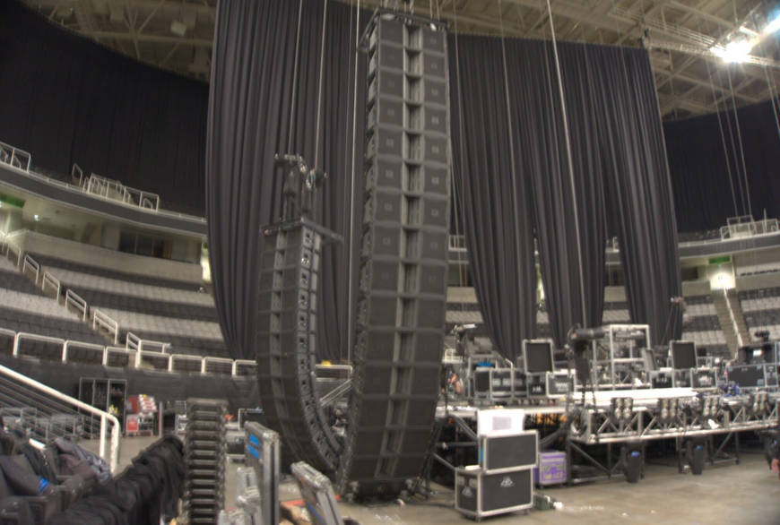 Crew setting up a stage before an event