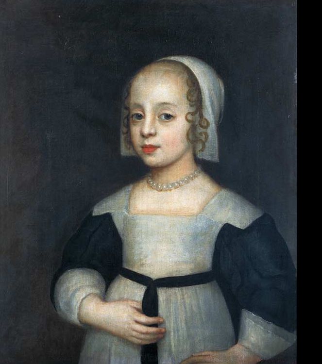 Portrait of a girl holding her belt