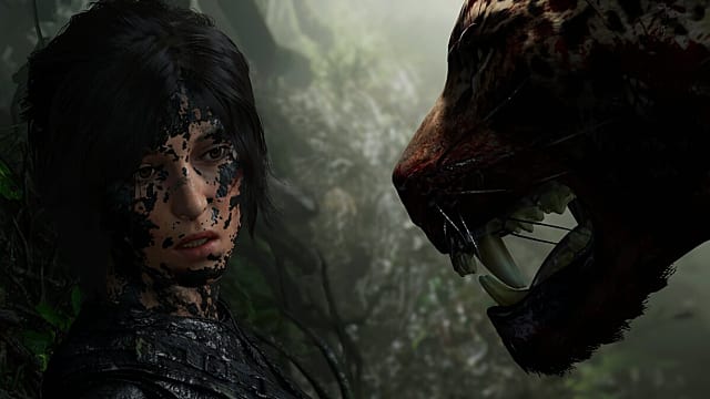 A jaguar growls in Lara Croft's face in Shadow of the Tomb Raider