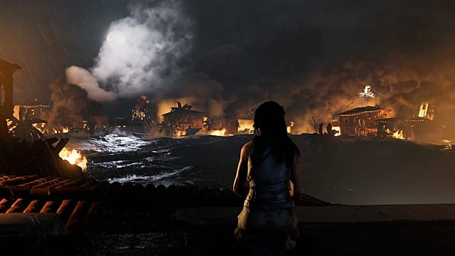 Lara Croft overlooks a city devastated by a tsunami in Shadow of the Tomb Raider