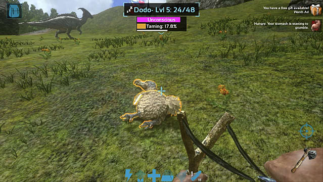 A players knocks out a Dodo with a slingshot