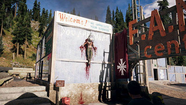 A decimated corpse in a semi-crucified pose in Far Cry 5