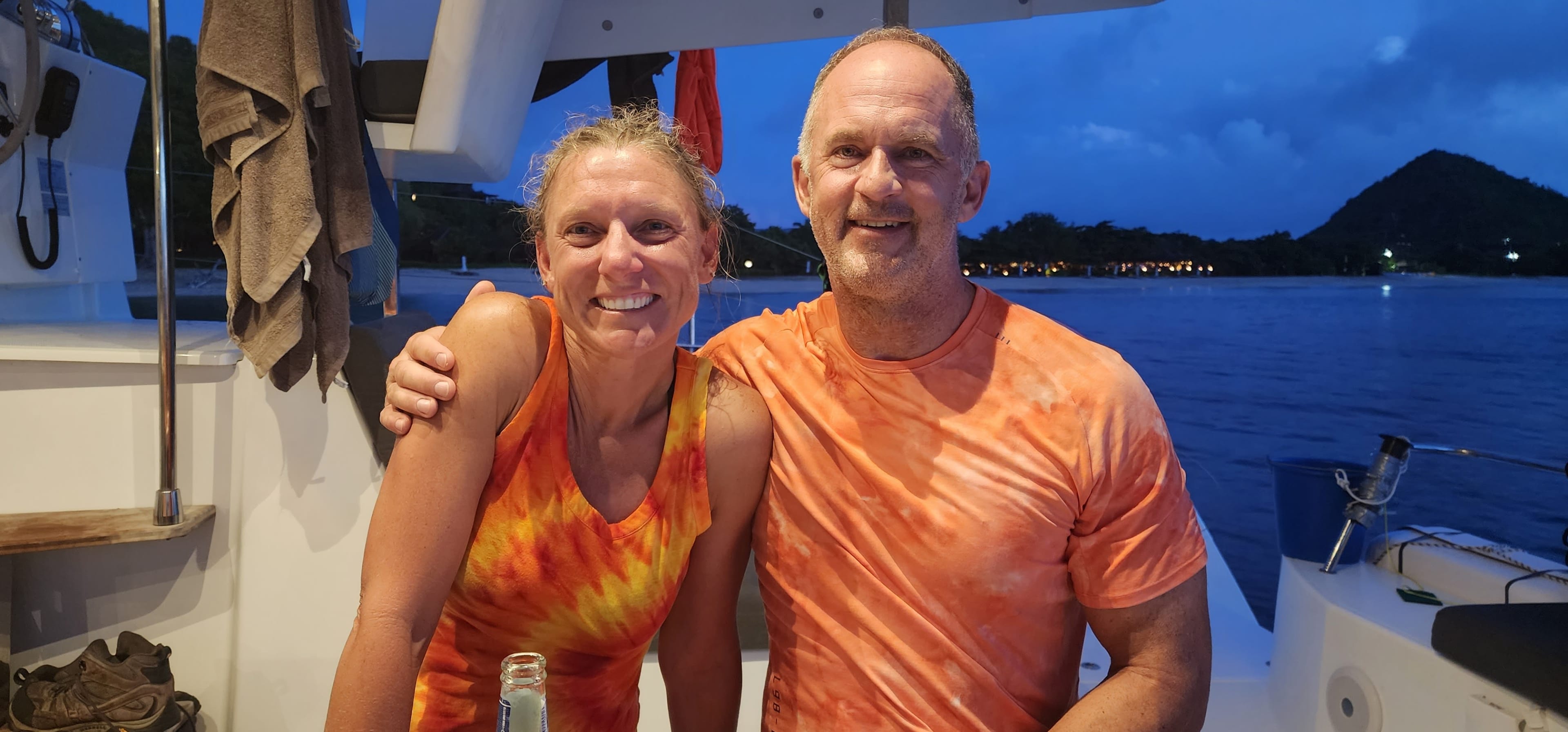 Bill and Julie on the water at dusk.